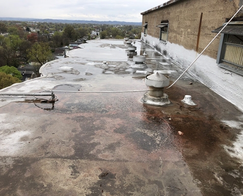 spray foam over concrete roof